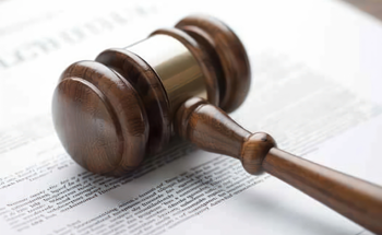 Image of a gavel on top of a document